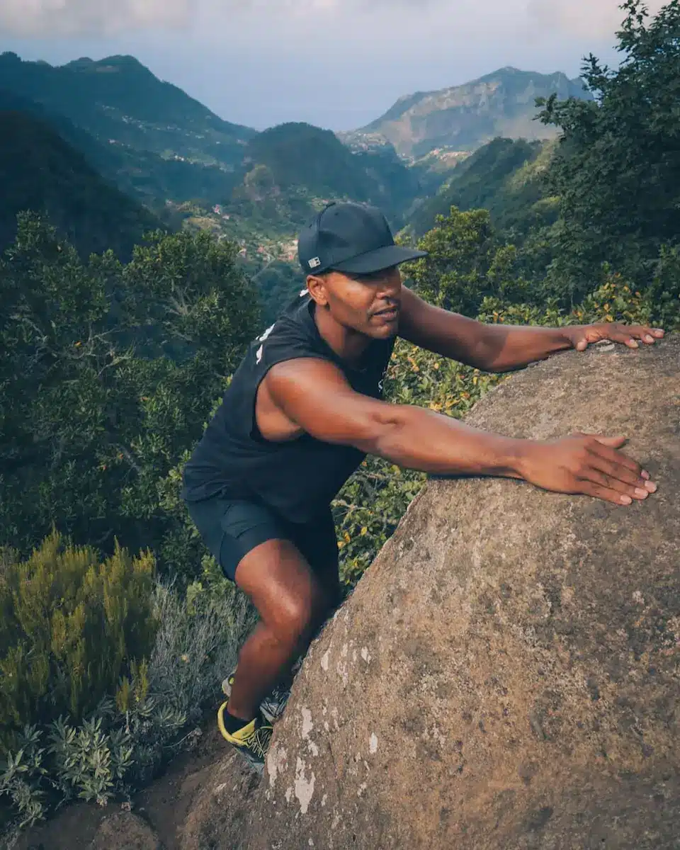poses-for-photos-climbing-pose-rock-mountain-background poses-for-photos-climbing-pose-rock-mountain-background